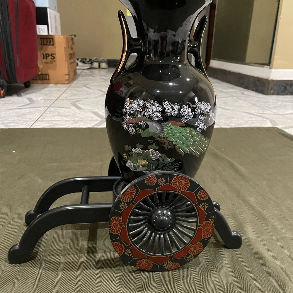 Elegant Black Floral Vase with Stand the card has a broken bar but it doesn’t